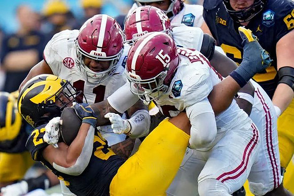 Jordan Marshall (23) and Josh Priebe (68)