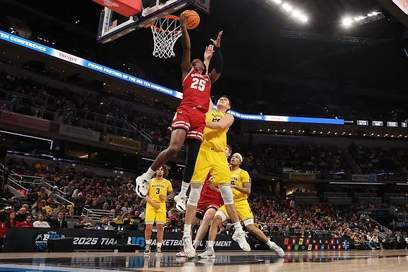 Tre Donaldson (3), Vladislav Goldin (50), and Rubin Jones (15)