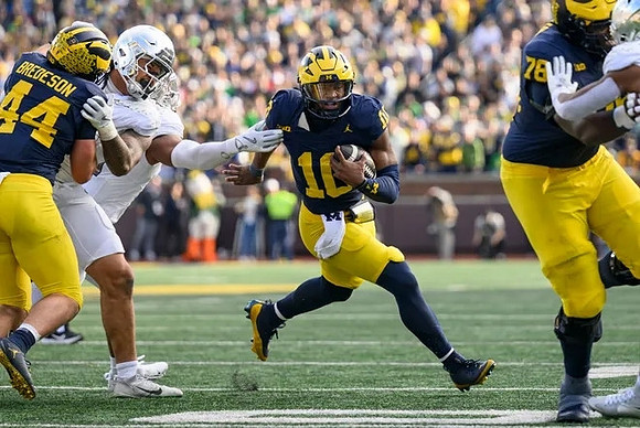 Max Bredeson (44), Alex Orji (10), and Myles Hinton (78)