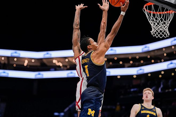 Danny Wolf (1) and Nimari Burnett (4)