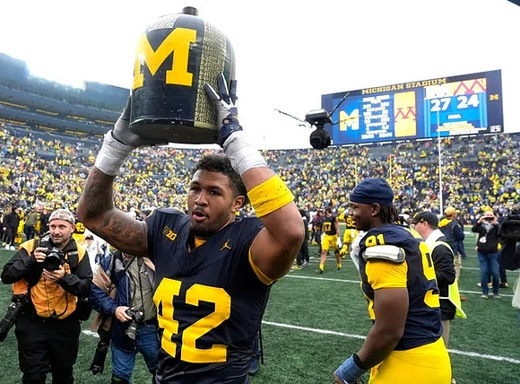 TJ Guy (42), Cameron Brandt (91), and The Little Brown Jug