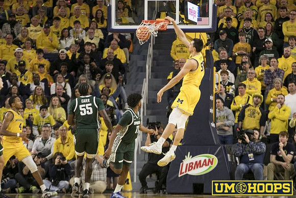 Nimari Burnett (4) and Vladislav Goldin (50)