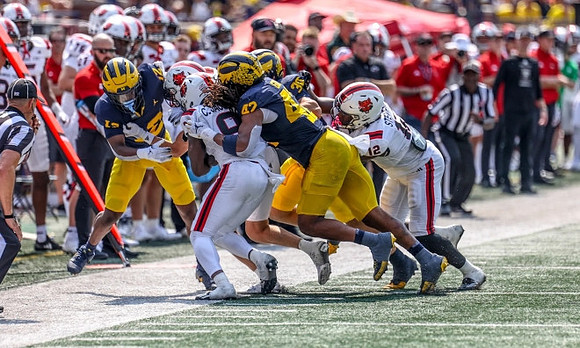 Ja'Den McBurrows (18) and TJ Guy (42)