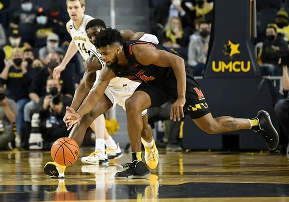 Jaron Faulds (44) and Moussa Diabate (14)