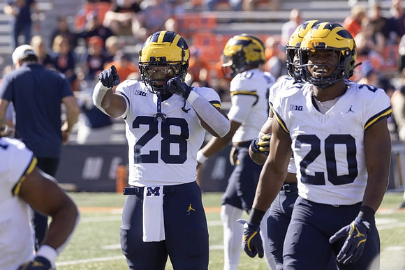 Quinten Johnson (28) and Jyaire Hill (20)