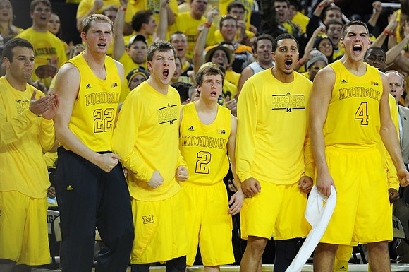 Josh Bartelstein (20), Blake McLimans (22), Matt Vogrich (13), Spike Albrecht (2), Jordan Morgan (52), and Mitch McGary (4)