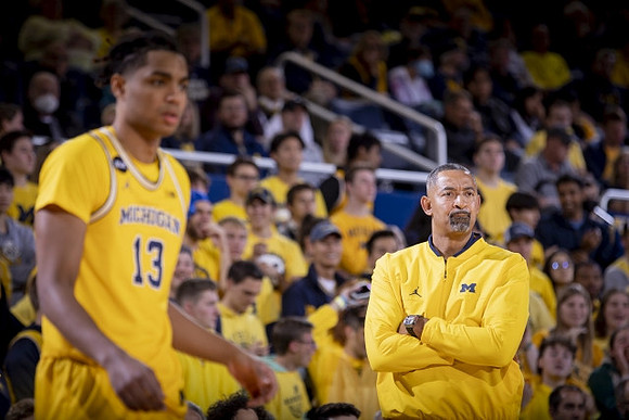 Jett Howard (13) and Juwan Howard