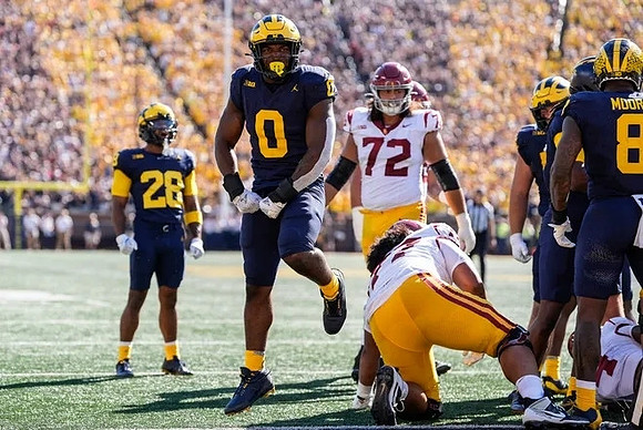 Quinten Johnson (28), Josaiah Stewart (0), and Derrick Moore (8)