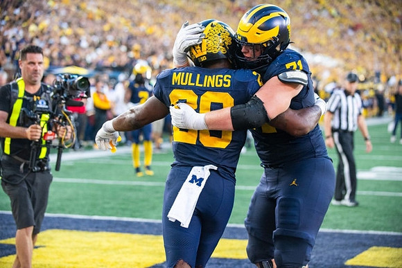 Kalel Mullings (20) and Evan Link (71)