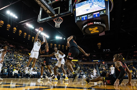 Eli Brooks (55), DeVante' Jones (12), Moussa Diabate (14), and Caleb Houstan (22)