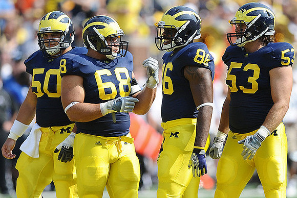 David Molk (50), Mike Martin (68), Kevin Koger (86), and Ryan Van Bergen (53)