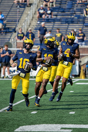 Davis Warren (16), Alex Orji (10), and Jayden Denegal (4)