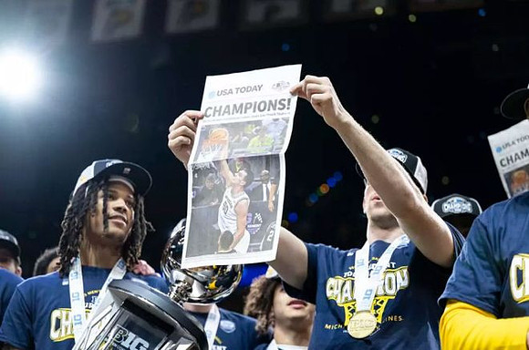 Michigan Team and Big Ten Tournament Championship Trophy