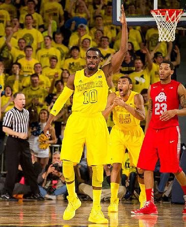 Tim Hardaway Jr. (10) and Jon Horford (15)