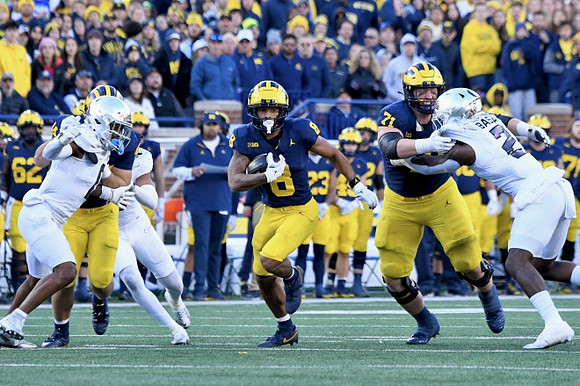 Tyler Morris (8) and Evan Link (71)
