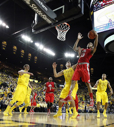 Nik Stauskas (11), Mitch McGary (4), and Trey Burke (3)