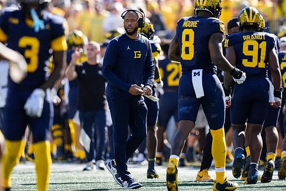 Derrick Moore (8) and Cameron Brandt (91)
