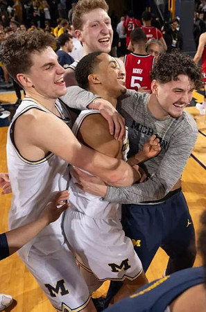 Will Tschetter (42), Danny Wolf (1), Nimari Burnett (4), and Ian Burns (14)