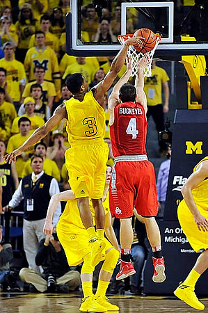 Trey Burke (3) and Nik Stauskas (11)