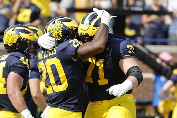 Max Bredeson (44), Kalel Mullings (20), and Evan Link (71)