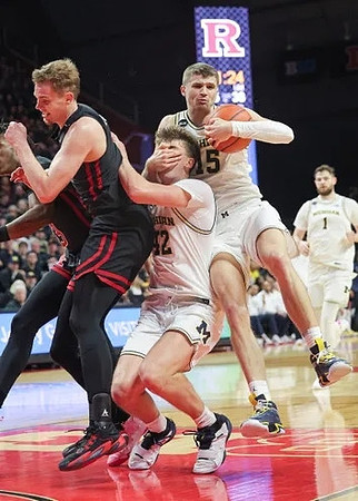 Will Tschetter (42), Joey Baker (15), and Hunter Dickinson (1)