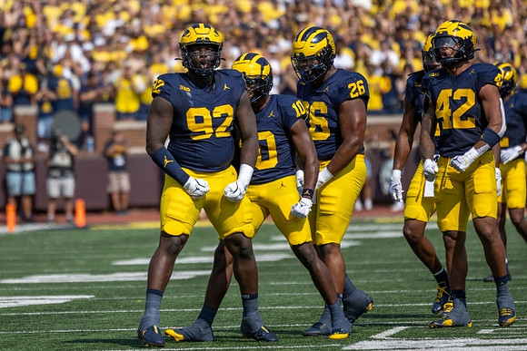 Ike Iwunnah (92), Zeke Berry (10), Rayshaun Benny (26), and TJ Guy (42)