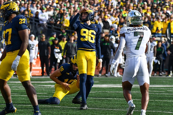 Tyler McLaurin (27), Tommy Doman (19), and Dominic Zvada (96)