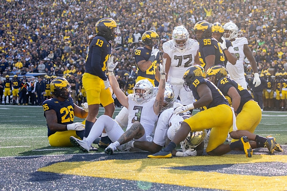 Rayshaun Benny (26), Wesley Walker (13), Quinten Johnson (28), Ernest Hausmann (15), Trey Pierce (95), and TJ Guy (42)