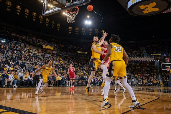 Terrance Williams II (5), Hunter Dickinson (1), and Tarris Reed Jr. (32)