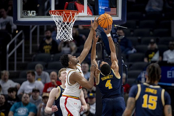 Danny Wolf (1), Nimari Burnett (4), and Rubin Jones (15)