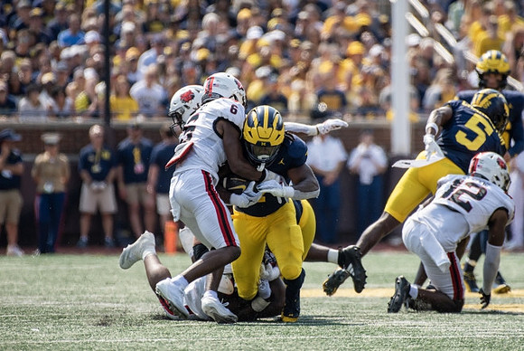 Donovan Edwards (7) and C.J. Charleston (5)