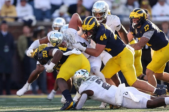 Kalel Mullings (20), Max Bredeson (44), and Marlin Klein (17)