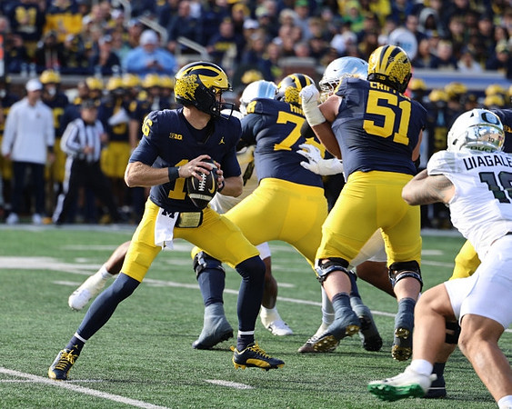 Davis Warren (16), Myles Hinton (78), and Greg Crippen (51)