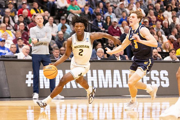 L.J. Cason (2) and UC San Diego Head Coach Eric Olen