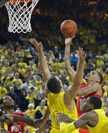 Mitch McGary (4) and Glenn Robinson III (1)