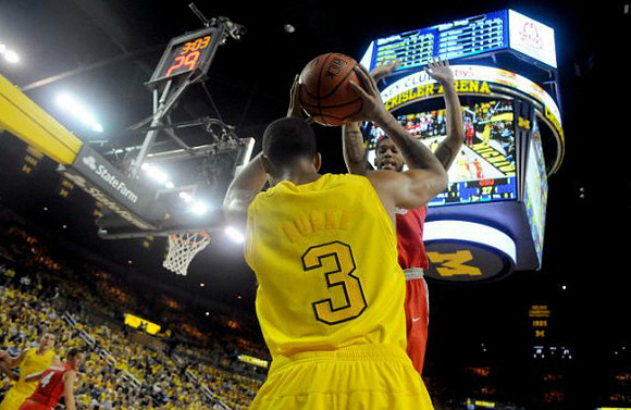 Trey Burke (3) and Mitch McGary (4)