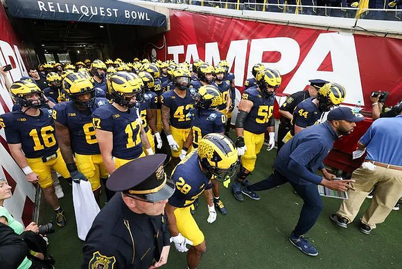 Sherrone Moore and Michigan Team