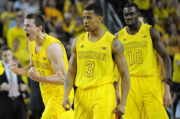 Nik Stauskas (11), Trey Burke (3), and Tim Hardaway Jr. (10)