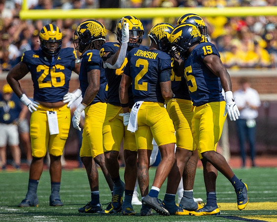 Rayshaun Benny (26), Makari Paige (7), Will Johnson (2), TJ Guy (42), and Ernest Hausmann (15)