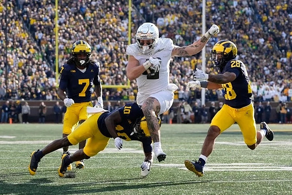 Makari Paige (7), Zeke Berry (10), and Quinten Johnson (28)