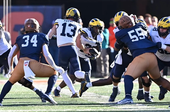 Jack Tuttle (13), Kalel Mullings (20), and Josh Priebe (68)