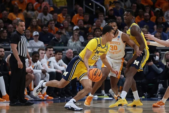 Caleb Houstan (22) and Moussa Diabate (14)