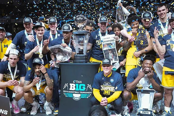 Dusty May, Michigan Team, and Big Ten Tournament Championship Trophy