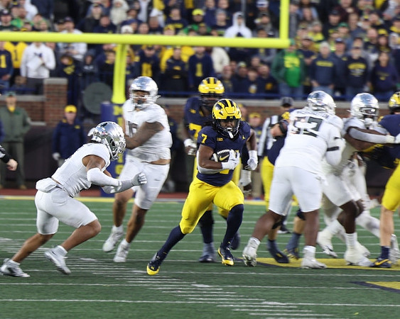 Myles Hinton (78) and Donovan Edwards (7)