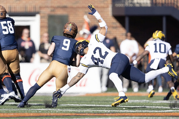 TJ Guy (42) and Zeke Berry (10)
