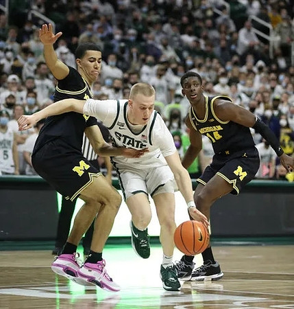 Caleb Houstan (22) and Moussa Diabate (14)