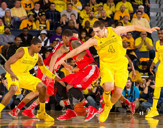 Glenn Robinson III (1), Mitch McGary (4), and Tim Hardaway Jr. (10)