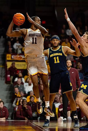 Roddy Gayle Jr. (11) and Will Tschetter (42)