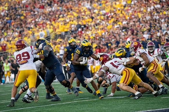 Dominick Giudice (56), Alex Orji (10), and Kalel Mullings (20)