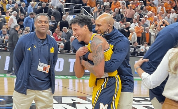 Eli Brooks (55) and Saddi Washington